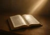 A Bible open with light symbolizing strength to resist temptation