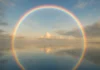 What The Rainbow Means In The Bible Explained A rainbow shining over calm waters symbolizing God’s covenant promise in the Bible